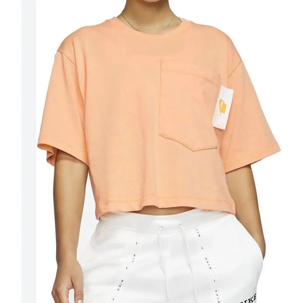 Nike orange cropped pocket front t shirt size M